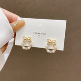 Arzonai bow stud earrings female Korean trendy temperament earrings net red pearl diamond garland round earrings